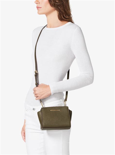 michael kors selma mini gold|selma mini crossbody bag.